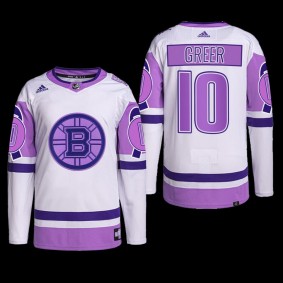 Boston Bruins Hockey Fights Cancer Jersey A.J. Greer White Purple #10 Primegreen Uniform