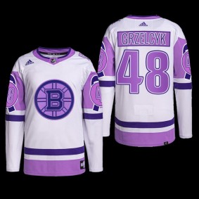 Boston Bruins Hockey Fights Cancer Jersey Matt Grzelcyk White Purple #48 Primegreen Uniform
